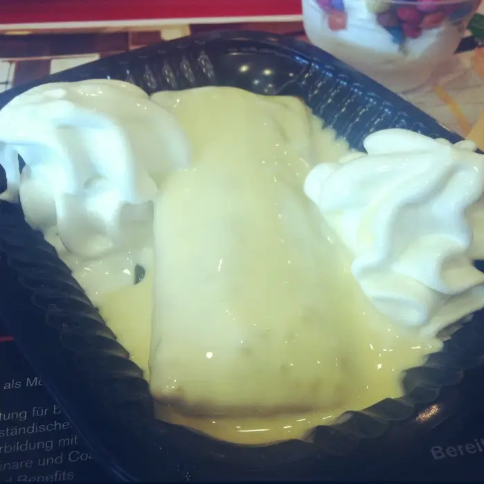 McCafé Apple pie with vanilla sauce and whipped cream